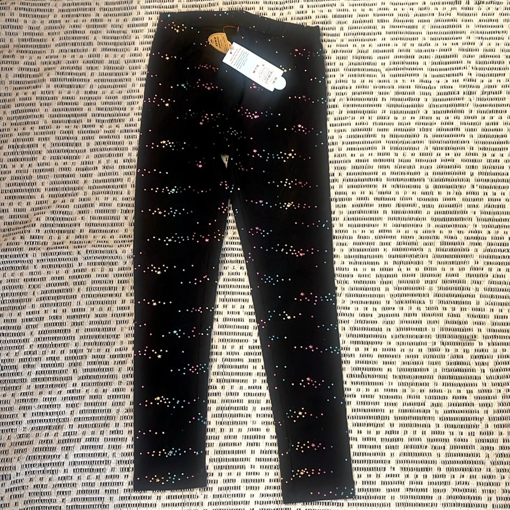 Black girl leggings with colorful, metallic stars size 7/8